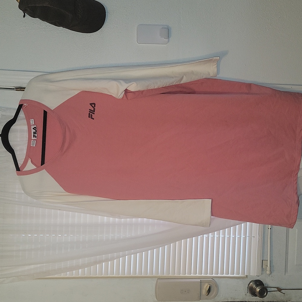 Fila long sleeve dress NWT. Has spot on back..pallet dirt. Im sure will washout.